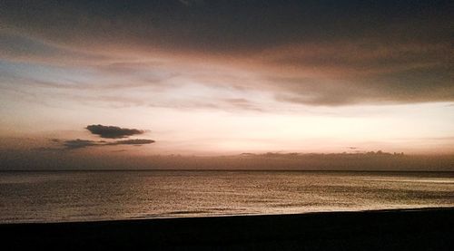 Scenic view of sea at sunset