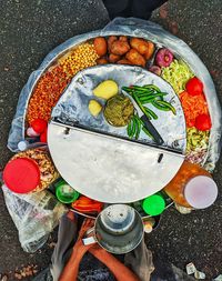 High angle view of hand holding food