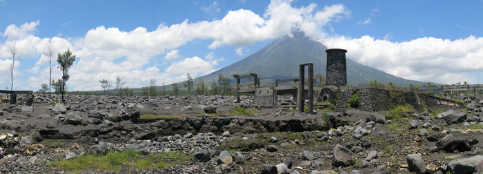 Built structure against cloudy sky