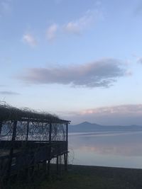 Scenic view of sea against sky at sunset