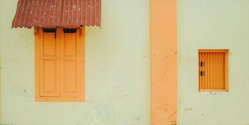 Close-up of yellow door