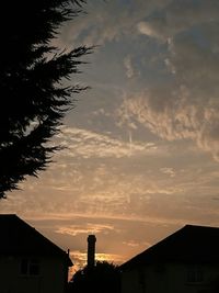 Low angle view of building at sunset