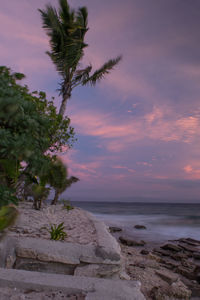 Scenic view of sea against sky at sunset