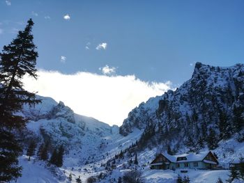 Scenic view of snowcapped mountains against sky