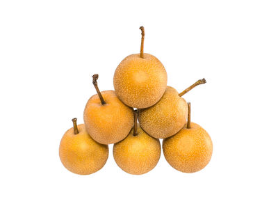 Close-up of oranges against white background