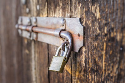 Close-up of padlock on door