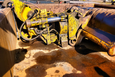 High angle view of machinery at construction site on sunny day