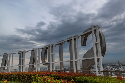 Built structure on bridge against sky