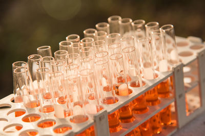 Close-up of test tubes on rack at laboratory