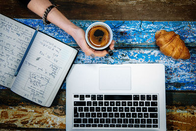 High angle view of coffee cup on table