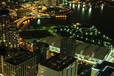 Aerial view of illuminated cityscape at night