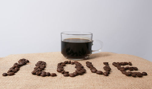 Close-up of coffee cup on table