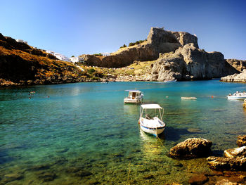 Scenic view of boats in sea