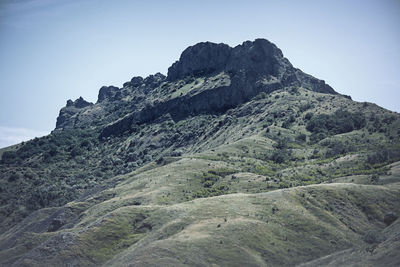 Low angle view of mountain against clear sky