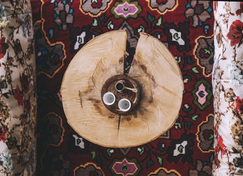 Directly above shot of electric fan on wood at home