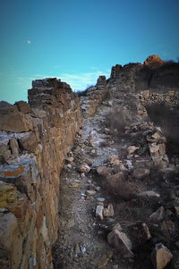 Rock formations against blue sky