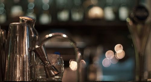 Close-up of wine bottles on table