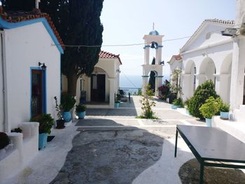 Exterior of houses and buildings against clear sky