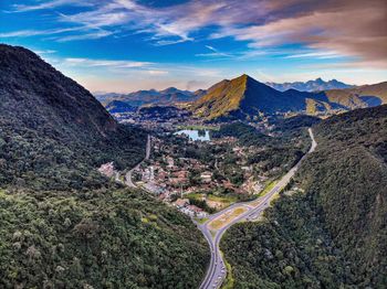 Aerial view of landscape and mountains against sky