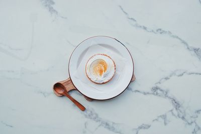 High angle view of coffee cup on table