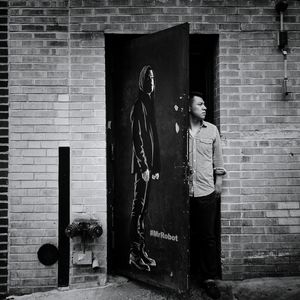 Shadow of person on brick wall