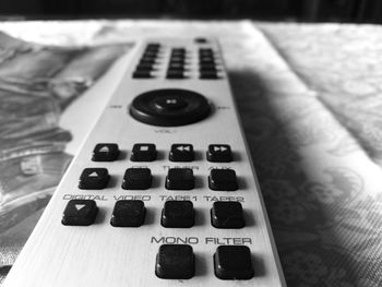 Close-up of piano on table