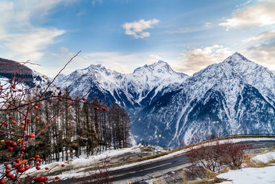 Scenic view of snowcapped mountains against sky