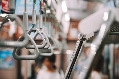 Close-up of handle in subway train