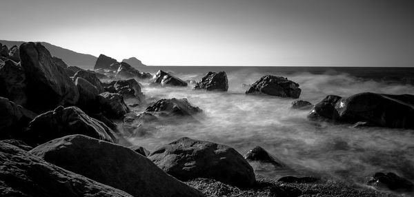 Scenic view of sea against clear sky