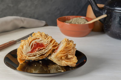 Close-up of food in plate on table
