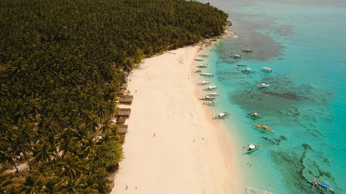 Aerial view of beautiful tropical island daco with white sand beach. 