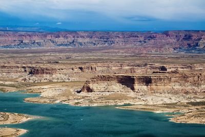 Aerial view of rock formations against sky