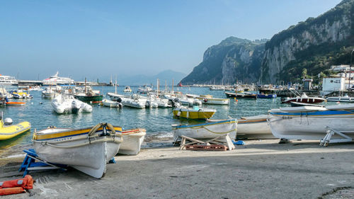 Boats moored at beach