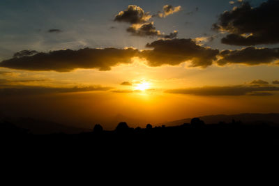 Scenic view of dramatic sky during sunset