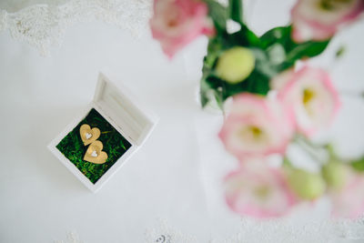 High angle view of white flowers on table