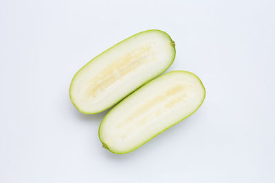 Close-up of lemon against white background