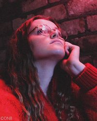 Portrait of young woman looking away