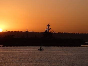 Silhouette of building at sunset