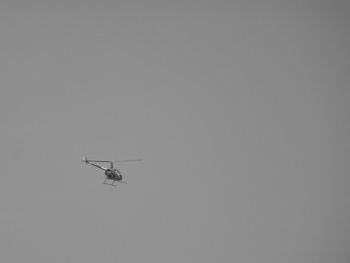 Low angle view of airplane in sky