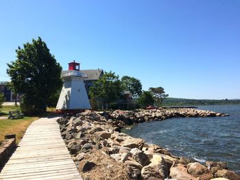 Scenic view of sea against clear blue sky