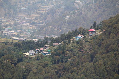 High angle view of townscape and trees in city