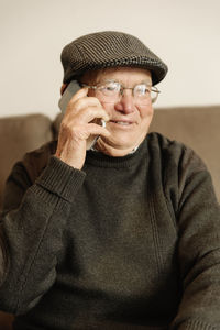 Portrait of man wearing hat