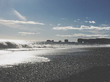 Scenic view of beach against sky