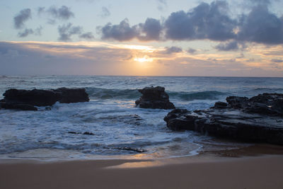 Scenic view of sea against sky during sunset