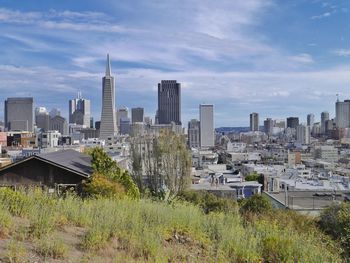 High angle shot of cityscape against sky