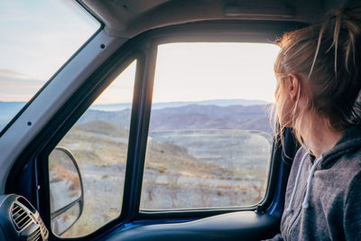 Woman sitting in car