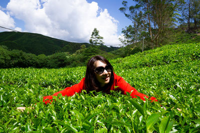 Portrait of woman on field