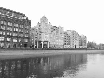 Reflection of buildings in lake