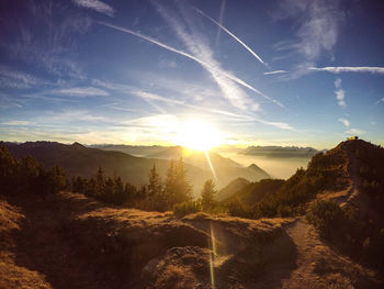 Scenic view of mountains against sky during sunset