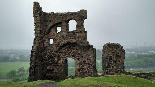 Old ruin building against sky